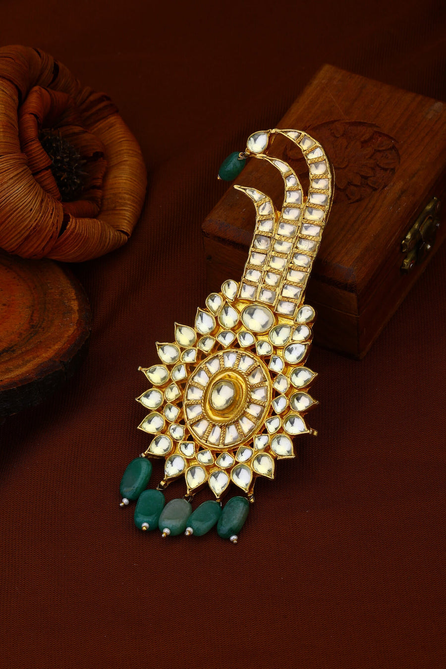 White Jadau Kundan Kalgi With Green Hangings