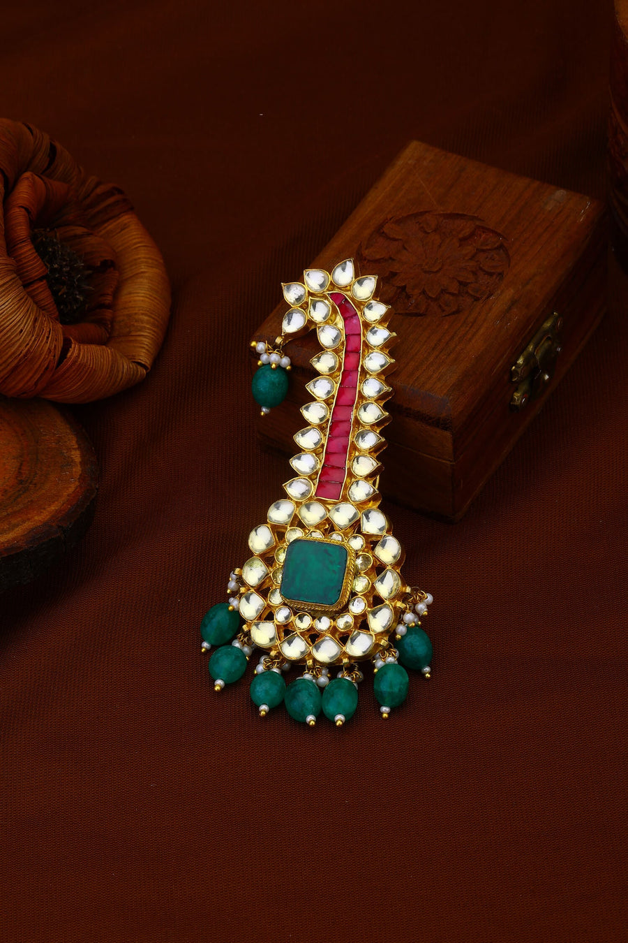 Pink And White Jadau Kundan Kalgi With Green Stone And Green Hangings